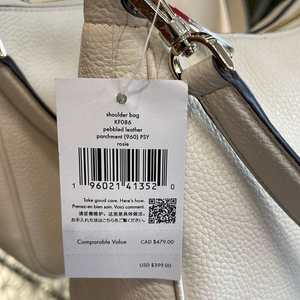 Kate Spade Rosie Shoulder Bag With Tech Attachment AirPod
Parchment
NWT - Picture 16 of 16
